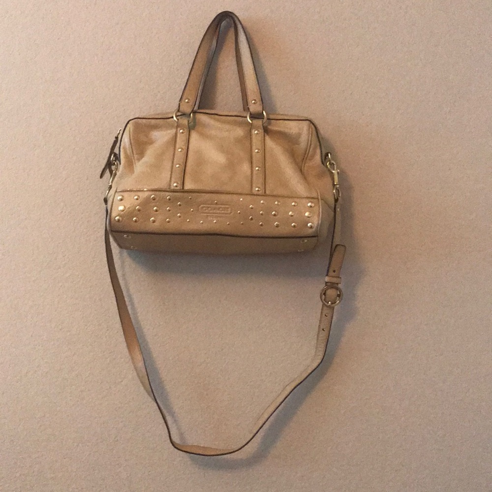 Tan and gold coach purse